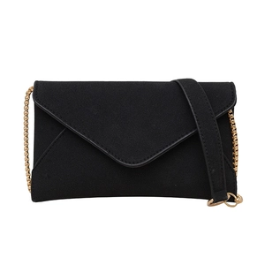 Chic black suede envelope shoulder bag with elegant gold chain strap for women