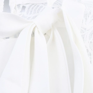 Elegant white lace blouse for women featuring a delicate bow tie and intricate lace detailing