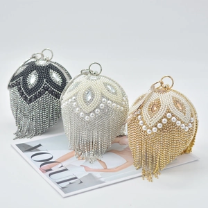Spherical evening clutch bag with rhinestones, pearls, and metallic tassels in three colors