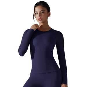Slim fit long sleeve yoga top in dark purple stretchy fabric for workout performance