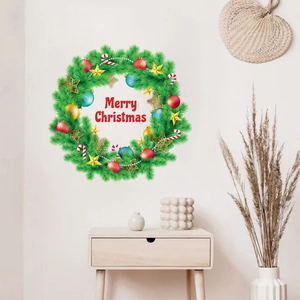 Detail showing self-adhesive Christmas wreath wall decal with Merry Christmas text on wall