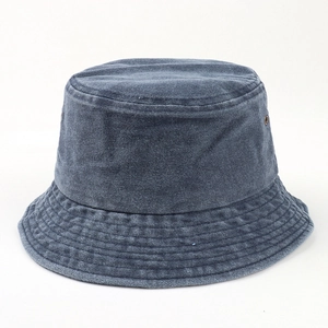 Detailed view of dark blue washed denim bucket hat with reinforced brim stitching