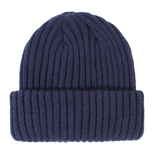 Detailed close-up of navy blue ribbed knit beanie showing thick warm texture and weave