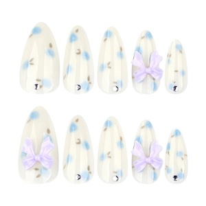Blueberry style almond press-on nails with floral patterns and purple 3D bows