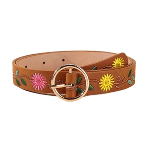 Vintage brown leather belt for women featuring floral embroidery and a gold circular buckle