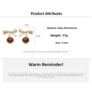 Detailed view of gold bow earrings with crystal pave and amber pear-cut gemstone drops