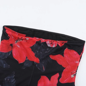 Detail of red floral print on mesh fabric with fine stitching for sexy tube dress