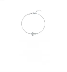 Macro shot of S925 silver cross bracelet with moissanite pave and lobster clasp