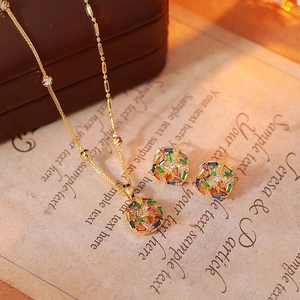 Detailed macro of 18k gold plated square zircon jewelry set with colorful crystals