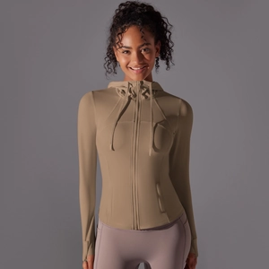 Close-up of slim fit hooded sports jacket with zipper and thumbhole cuffs detail