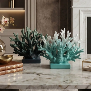 Minimalist resin coral ornaments in deep green and cyan on square bases for home decor
