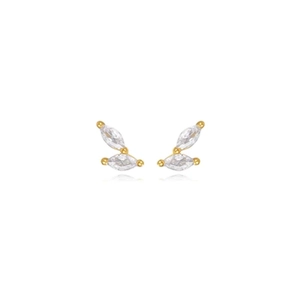 Macro detail of gold earrings featuring marquise-cut zircons and mirrored reflections