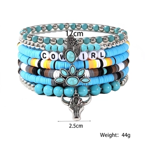 Bohemian multi-layer turquoise cowgirl bracelet set with silver cactus and bull skull charms