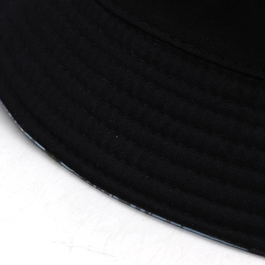 Close-up detail of reinforced parallel stitching on black cotton sun bucket hat brim