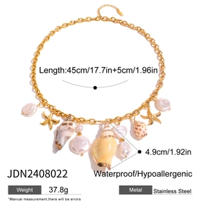Detail van roestvrijstalen zeester en parelhangers aan een 45 cm waterdichte ketting