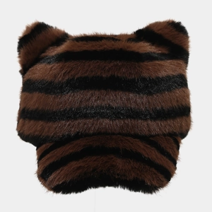 Detailed view of thick zebra-print plush fabric and cute ears on this warm baseball cap
