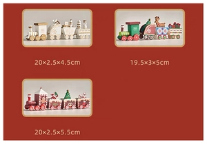 Detail view of colorful wooden Christmas train ornaments in red, green, and white