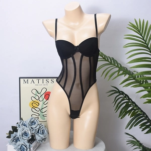 Detail of black mesh bodysuit featuring underwire cups and vertical boning design