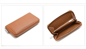 Detail of brown leather wallet with card slots, coin pocket and silver zipper closure