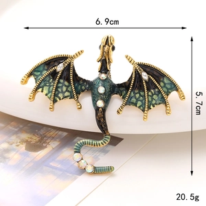 Vintage green enamel dragon brooch with gold finish and rhinestones, 6.9cm x 5.7cm size