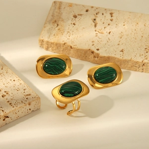 Gold stainless steel jewelry set featuring oval malachite stone ring and earrings