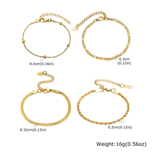 Detail view of 18K gold plated stainless steel snake, figaro and twist chain set