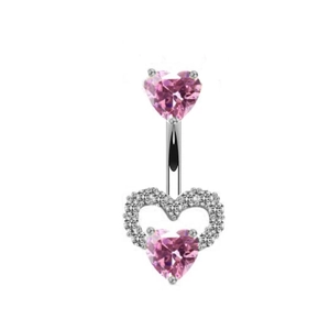 Detail of heart belly ring featuring pink crystals and silver-tone curved barbell bar