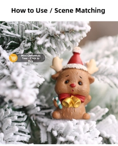 Macro view of a miniature resin reindeer ornament with a red hat and candy cane
