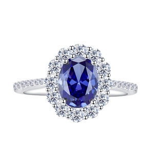 Classic oval blue sapphire halo ring with sparkling pavé cubic zirconia accents