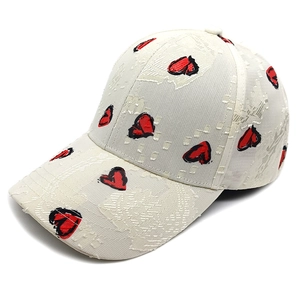 Breathable white lace baseball cap with red heart patterns for outdoor sun protection