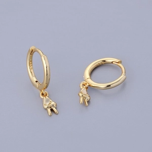 Close-up of gold-plated 925 silver hoop earrings with peace sign charms and S925 hallmark