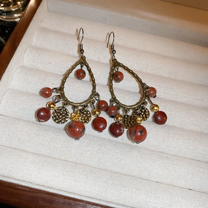 Bohemian retro drop tassel hook earrings with teardrop frames and bronze stone beads