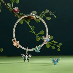 S925 sterling silver insect charm bracelet featuring colorful enamel butterflies and a ladybug