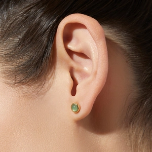 Close-up of green aventurine stone stud earring with 24K gold-plated metal base
