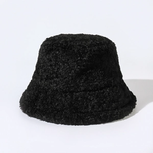 Close-up of the thick black sherpa fleece texture on a warm winter bucket hat