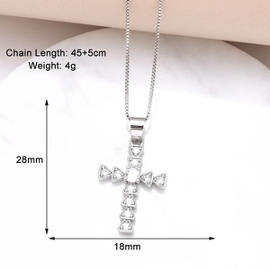 Detail showing cross necklace dimensions 28mm by 18mm and 45cm chain length info