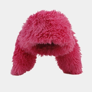 Plush hot pink rabbit ear trapper hat for women with fluffy faux fur texture