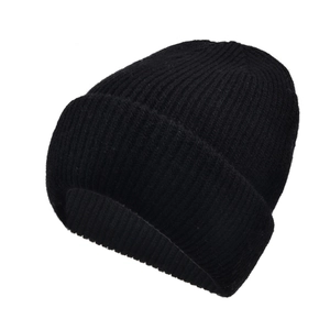 Detail of classic black rib-knit beanie showing soft texture and folded cuff design