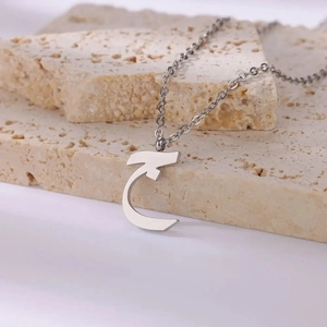Fashion silver stainless steel necklace featuring a minimalist Arabic letter pendant