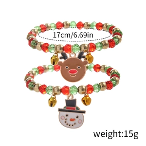Detail of Christmas beaded bracelets with reindeer and snowman charms, 17cm circumference