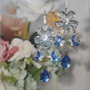 Exquisite sky blue butterfly teardrop tassel earrings with silver accents and crystals