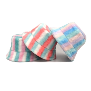 Winter fluffy bucket hat with colorful rainbow stripes made of soft faux rabbit fur