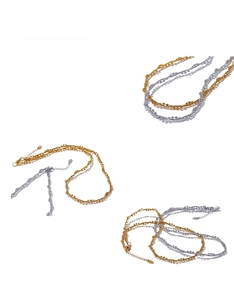 Detail of gold and silver beaded necklaces with lobster clasp and adjustable extension chain