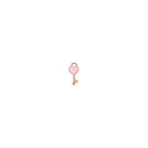 Detailed view of heart-shaped pink and gold key pendant with top hanging loop