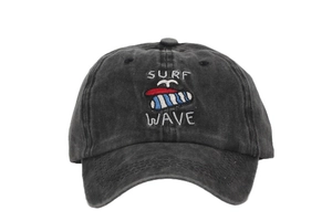 Detail of grey washed cotton baseball cap with Surf Wave embroidery and vintage texture