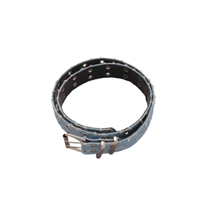 Vintage light blue denim waist belt with double-row metal eyelets and distressed frayed edges