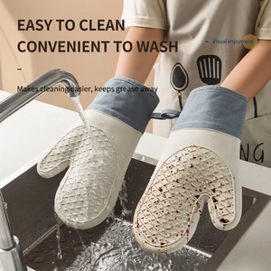 Waterproof silicone oven mitts with non-slip mesh texture and heat resistant grey fabric cuff