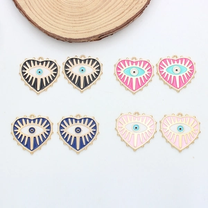 Handmade alloy heart charms with evil eye enamel patterns in four assorted colors