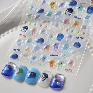 3D jelly fish nail stickers with colorful ocean patterns and bubble designs on white tray