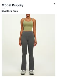 Detail view of high-waist sea rock grey flare yoga pants with a green crop top